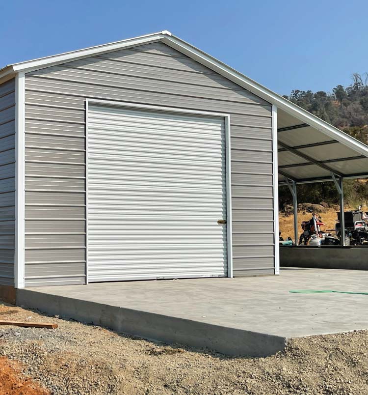 Heavy-duty commercial metal garages building, 40x51x16, featuring a walk-in door and robust concrete foundation for workshop use.